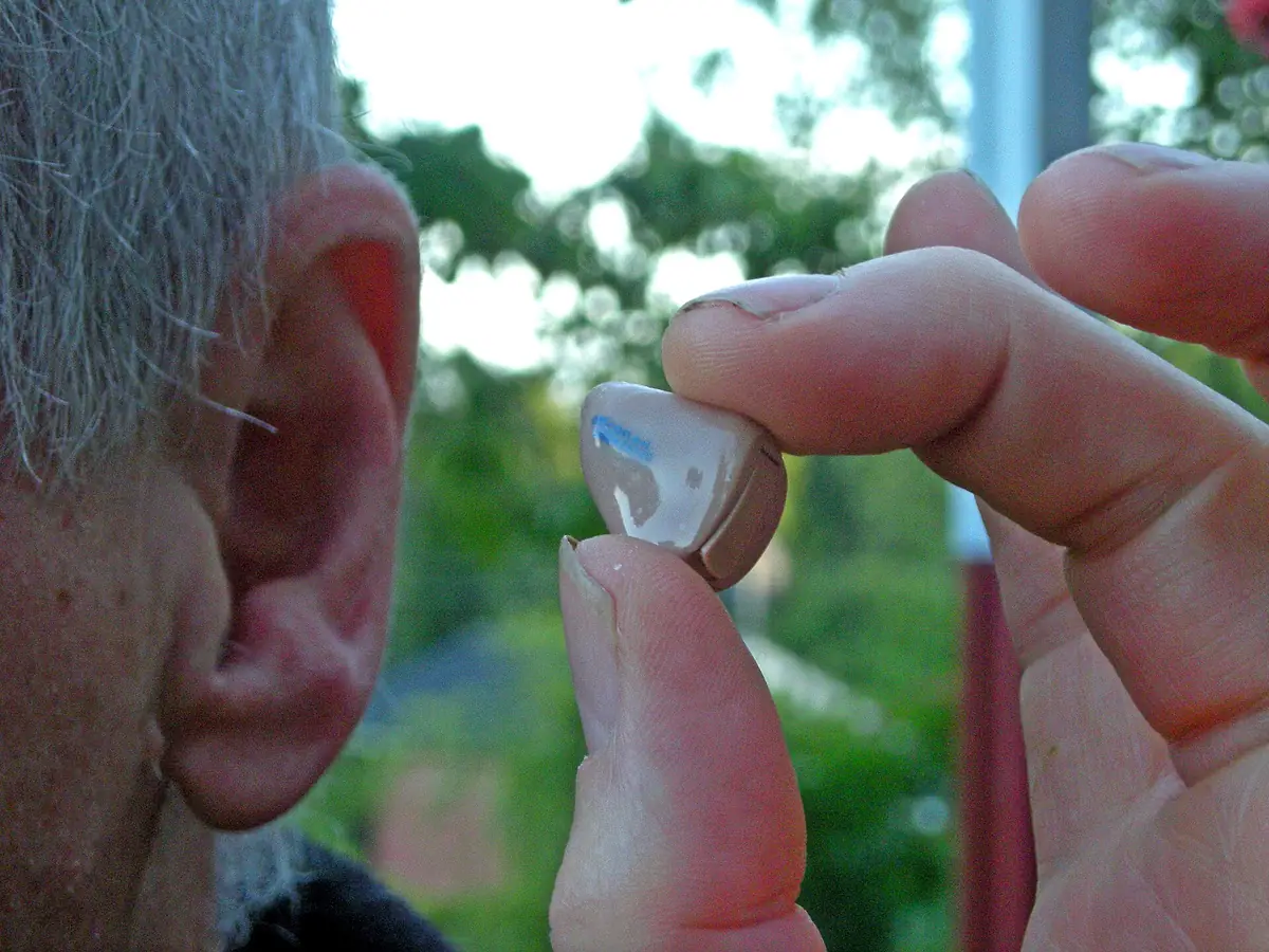 Modern digital hearing aid photographed up close